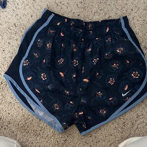 Nike Women's Navy Floral Running Shorts with Coral Accents